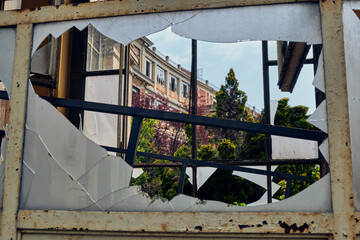 Abandoned hospital courtyard with classical architecture