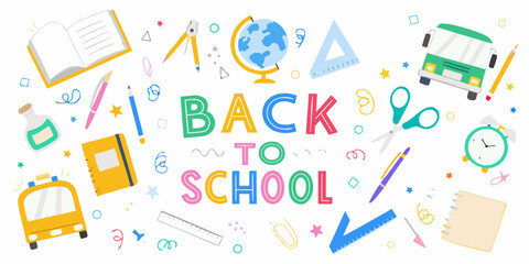 Back to school supplies scattered around a colorful playful learning environment