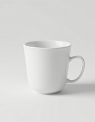 A photorealistic studio shot of a matte‑white ceramic coffee mug with a subtle lip‑rim, placed on a seamless white background, soft diffused key‑light from the left, gentle drop shadow, 8k