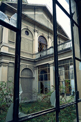 Abandoned historic hospital with domed roof