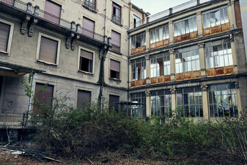 Facade of abandoned hospital building