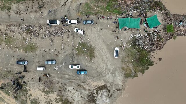 Flood in Punjab Drone aerial showing flooded fields aerial view of floodwaters overflowing onto farmland road in Punjab Pakistan flooded villages 4k 