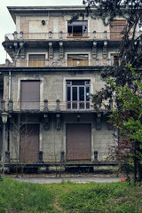Facade of abandoned hospital building