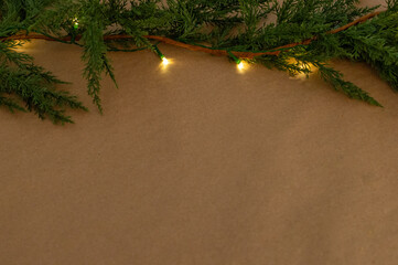 Christmas Garland with Warm Lights on Neutral Background. Minimal Christmas Garland with Warm Light Background.