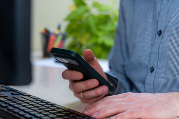 Smartphone Business Communication At Office Desk With Keyboard, Work Technology For Remote Productivity, Calls, Messages, Two Device Multitasking And Support