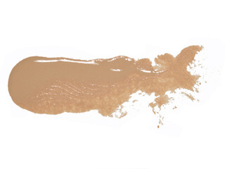 A smear of beige foundation on a white background