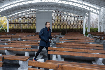a male spectator in a summer theater
