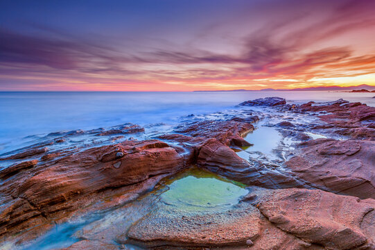 Coastal rocky landscape at sunset, Le Dramont, Var, Provence-Alpes-Cote d'Azur, France