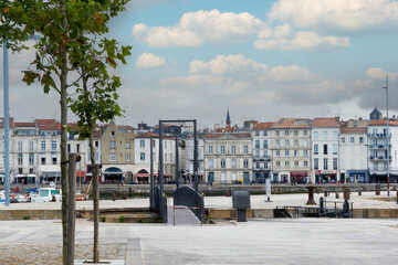 Vieux Port of La Rochelle (Charente-Maritime). Footbridge providing access to the Quai du Car&eacute;nage, Valin Square and Quai Duperr&eacute; with view of the Town Hall Tower
