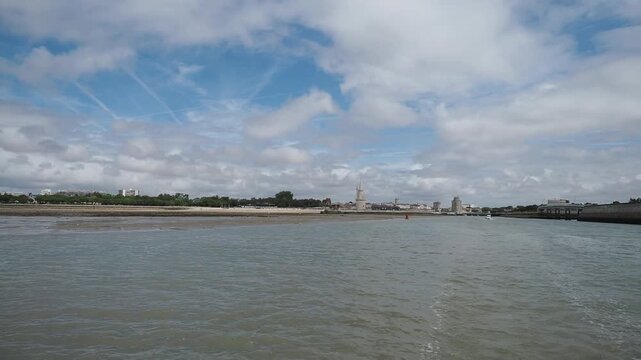 La Rochelle in Charente-Maritime - Navigation on the Marans to La Rochelle canal from the old harbour and lantern tower along the New World breakwater to the new port Minimes and Lazaret Basin