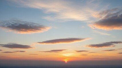 Sunset in the Clouds A Serene Sky with Fiery Hues and Soft Light