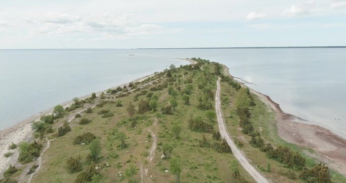 Aerial view of S&auml;&auml;retirp, a narrow peninsula or spit extending into the sea from Kassari island in cloudy spring weather, Hiiumaa, Estonia.