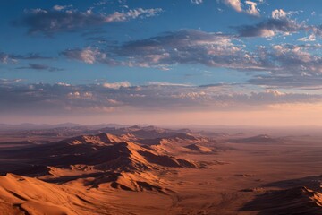 Naklejka premium Vast desert with sand dunes at dusk