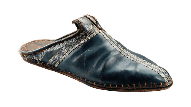 Moroccan leather babouche slipper with traditional stitching, isolated on a white background.