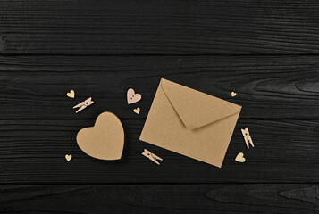 Preparing Valentine gifts on black wooden table