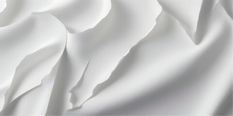 Luxury white silk and satin fabric texture featuring soft waves and smooth curves creates a light cream material design perfect for a wedding backdrop or elegant wallpaper surface