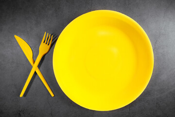 plate with cutlery on a white background