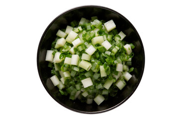 sliced ​​onions in a black round bowl top view