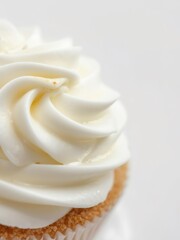 Luxurious vanilla buttercream swirl on cupcake, cloud dancer texture. Perfect for 2026 bakery trends, dessert menus, food blogs. Soft lighting highlights creamy peaks and artisan details.