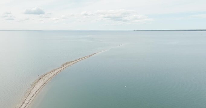 Aerial view of S&auml;&auml;retirp, a narrow peninsula or spit extending into the sea from Kassari island in cloudy spring weather, Hiiumaa, Estonia.