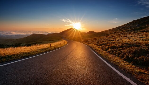 bright sunrise illuminating a winding road symbolizing the start of a new path