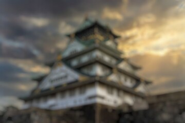Naklejka premium Blurry low angle Osaka Castle in Japan