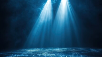 Obraz premium Two Blue Stage Spotlights with Mist Effect over Dark Background
