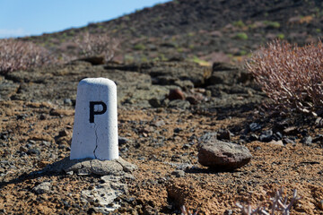 Rocky Tenerife coast around Montana Bocinegro and Montana Roja mountain, near El Medano, Canary Islands, Spain, sunny summer day