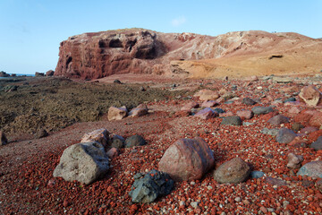 Rocky Tenerife coast around Montana Bocinegro and Montana Roja mountain, near El Medano, Canary Islands, Spain, sunny summer day