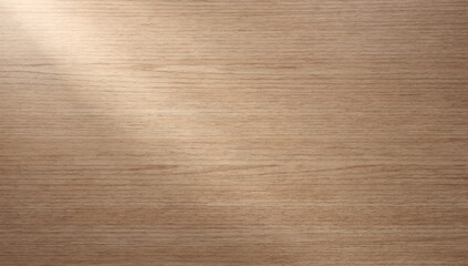 A warm, light brown wooden background featuring natural grain patterns and a smooth finish, subtly illuminated from the top left corner