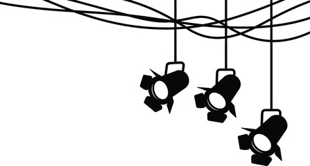 Three spotlights hanging from ceiling