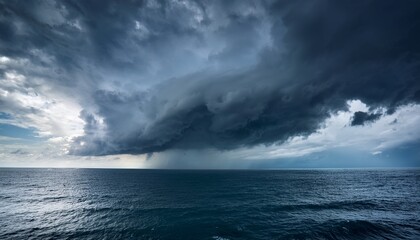 Obraz premium Dramatic Storm Clouds Gathering Over The Ocean Intense Weather Approaching Storm