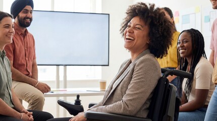 Diverse People Team Laughing in Inclusive Office Meeting with Woman in Wheelchair