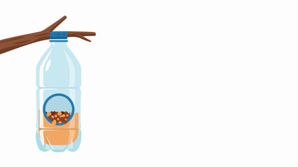 DIY bird feeder crafted from plastic bottle hangs on tree branch, filled with birdseed. Creative DIY bird feeder provides food for wild birds during winter.