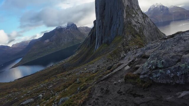 Breathtaking first person view of a mountain path in Norway leading to the majestic Segla peak