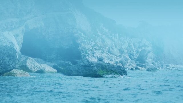 Misty Coastal Landscape With Sea Cave