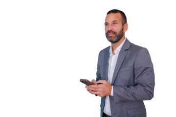 Businessman standing, looking away while holding smartphone, texting and communicating, on transparent background
