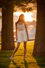 Slavic Woman in White Dress at Sunset