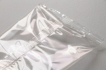 Transparent polyethylene packaging with a longitudinal seal, macro shot of smooth film, industrial packaging material for goods