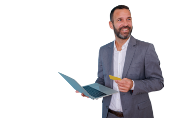 Businessman holding laptop and credit card, smiling for online shopping and secure e-commerce transactions on transparent background