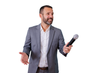 Man presenter holding a microphone, talking and gesturing during an interview, conference, or public speaking event. Transparent background