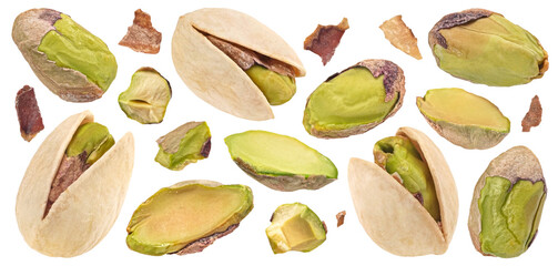 Pistachios whole and chopped isolated on white background, full depth of field