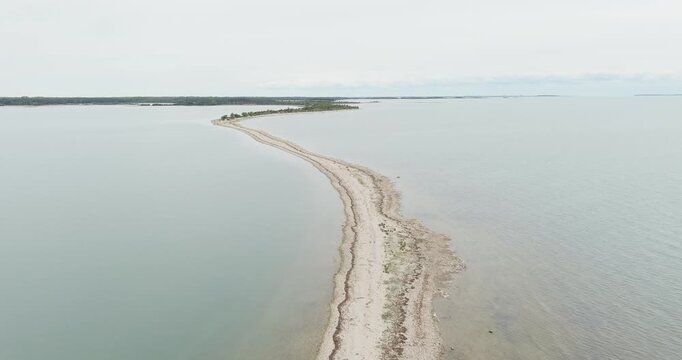 Aerial view of S&auml;&auml;retirp, a narrow peninsula or spit extending into the sea from Kassari island in cloudy spring weather, Hiiumaa, Estonia.