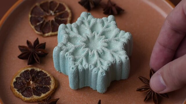 Christmas mochi, mooncake, or cheesecake shaped like a snowflake. Christmas mochi or cheesecake