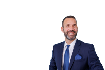 Bearded man in a navy suit and blue tie smiling, looking to the side with optimism and confidence. Transparent background