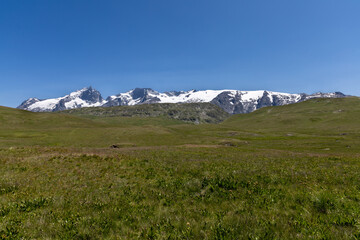 Fototapeta premium Mountain landscape of the Emparis Plateau in the Arves Massif, Hautes-Alpes, France.