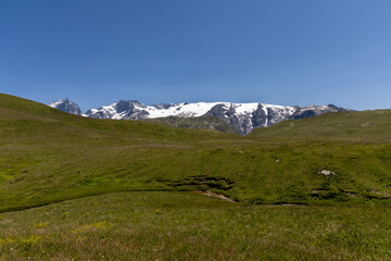 Fototapeta premium Mountain landscape of the Emparis Plateau in the Arves Massif, Hautes-Alpes, France.