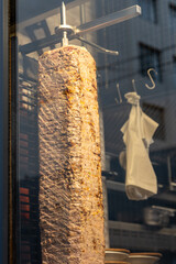 Close-Up of Turkish Beef Doner Cooking on Rotisserie Grill
