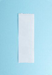 Blank paper receipt on blue background with copy space, minimalist financial document mockup for accounting, billing, expense tracking, and fintech design use