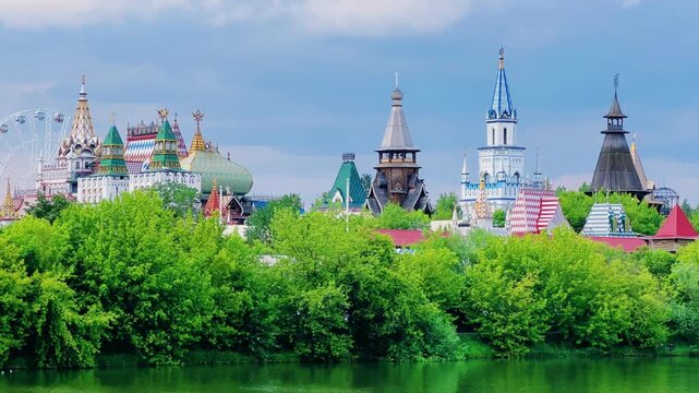 Russian traditional architecture, the Kremlin in Izmailovo, on the shore of a pond, Moscow. The architectural ensemble is stylized under Russian architecture of the 16-17 centuries. Gingerbread houses